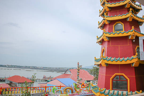 istock buddhism tower with sea background 489140322