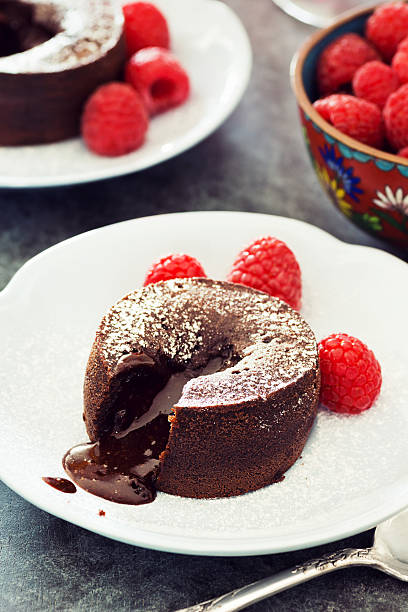 istock Two Baked Chocolate Lava Cakes with Raspberries 489140928
