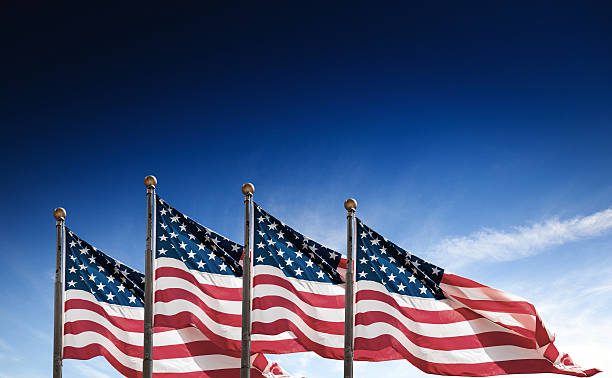 istock us national flag waving on the wind 489141446