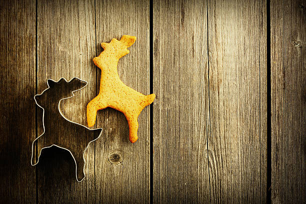 istock Christmas homemade gingerbread deer cookie 489143216