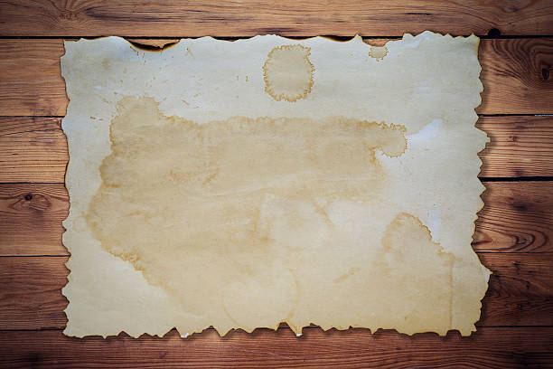 istock old paper on wood background and texture with space. 489145128