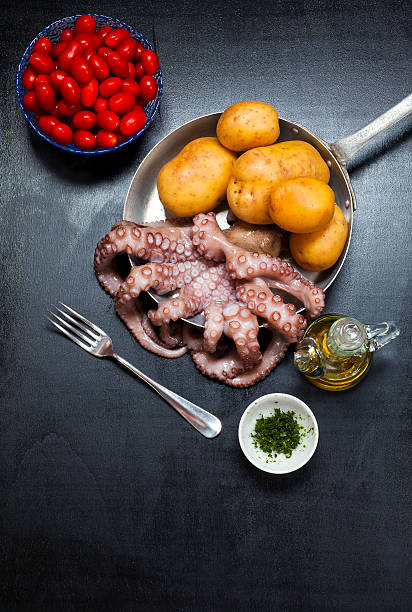 istock ingredients for cooking octopus hot salad with potatoes. olive o 489146510