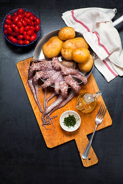 istock ingredients for cooking octopus hot salad with potatoes. 489146932