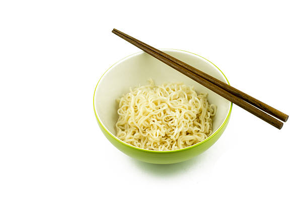 istock Instant noodles in green cup isolated on white background 489148054