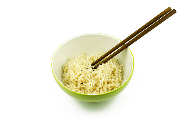 istock Instant noodles in green cup isolated on white background 489148496