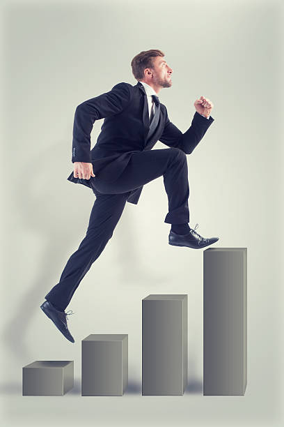 istock Businessman running up profitable diagram 489151154