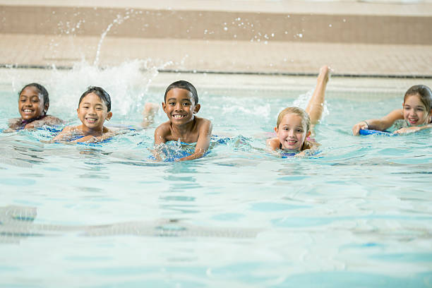 istock Kids Kicking in the Water 489151444