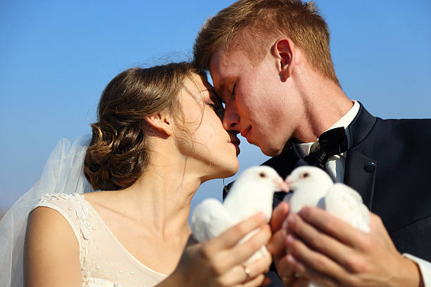 istock Wedding couple with pigeons 489152634