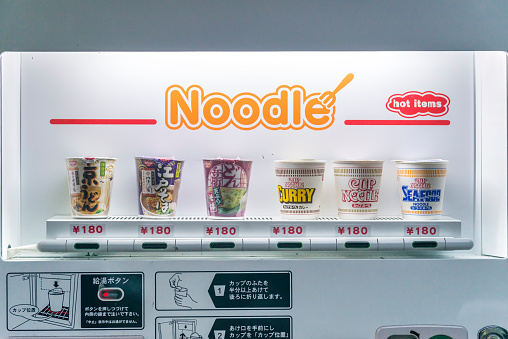 Hakone, Japan - August 8, 2015: A line of cup noodles on display for purchase in a vending machine