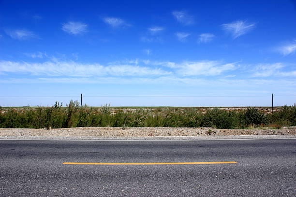istock Asphalted road and the blue sky 489167334