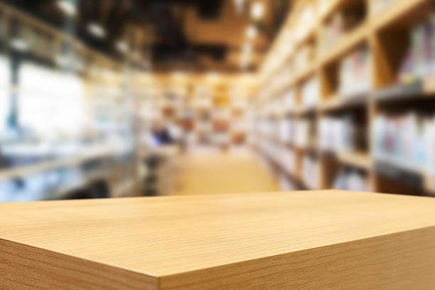istock Empty wooden table and modern library background, product displa 489167662