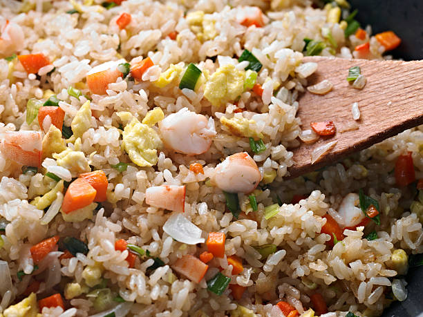 Fried Rice Close up of Fried Rice with Seafood. chinese cuisine fried rice asian cuisine wok stock pictures, royalty-free photos & images