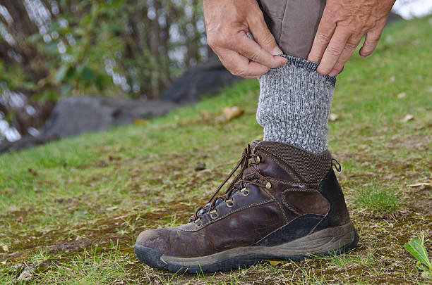 Schutz gegen Zecken durch Biesendetails Hose in die Socken. – Foto