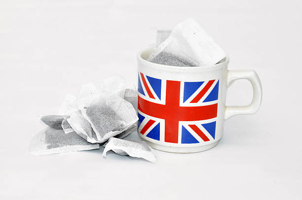English Mug with Tea Bags Inside stock photo