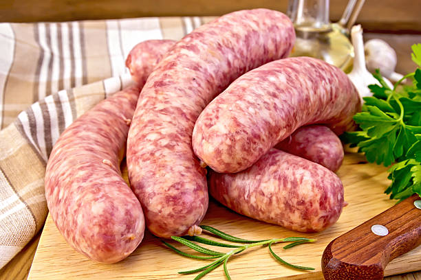 istock Sausages pork on board with knife 489171702