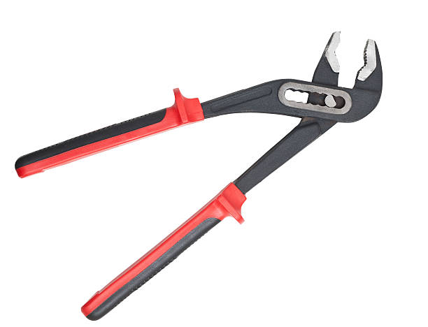 clé anglaise poignée rouge isolé avec un tracé de détourage - adjustable wrench wrench clipping path red photos et images de collection