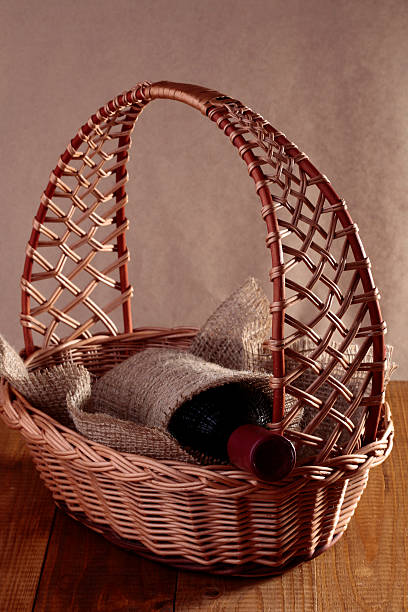 istock Bottle of wine in basket 489176686