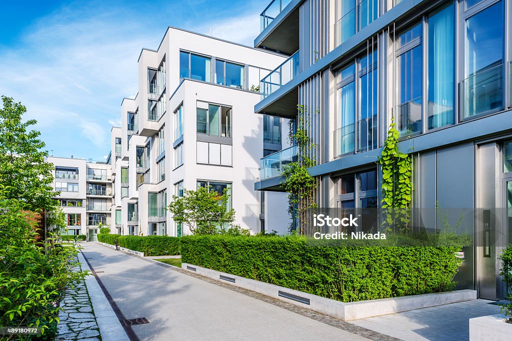 New white apartment houses New white apartment houses in Berlin, Germany Apartment Stock Photo