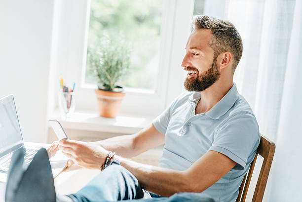 istock relaxed businessman at desk 489181056