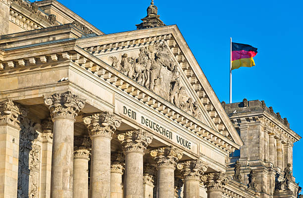 istock The German Reichstag in Berlin with national flag 489181262