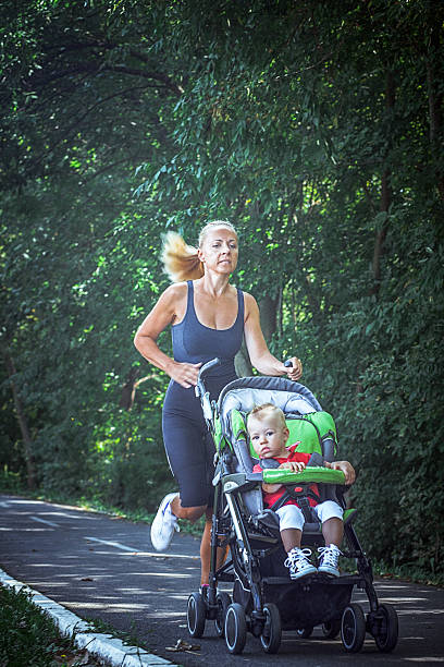 istock Jogger mom with baby in stroller 489181668