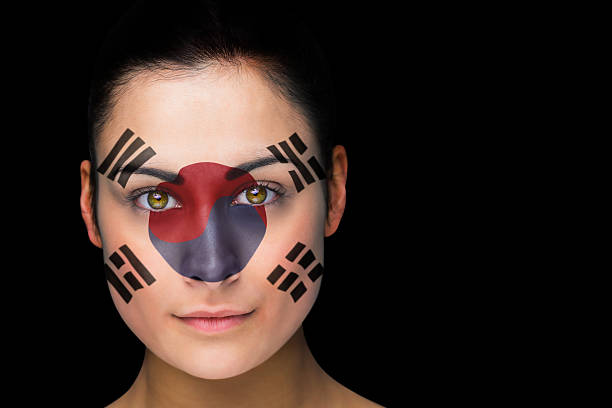 istock Korea football fan in face paint 489192437