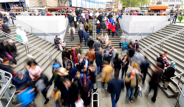 istock Crowd of anonymous people 489193057