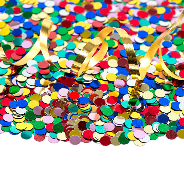 istock colorful confetti background with golden streamer 489193751