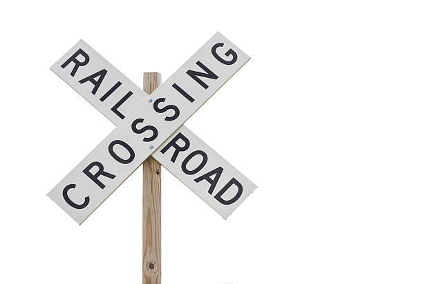 railroad-sign - railroad crossing train railroad track road sign stock-fotos und bilder