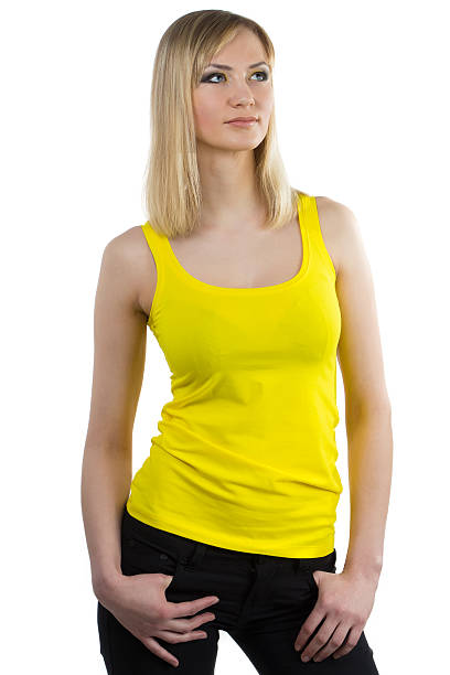 istock Young woman with yellow makeup looking up 489195671