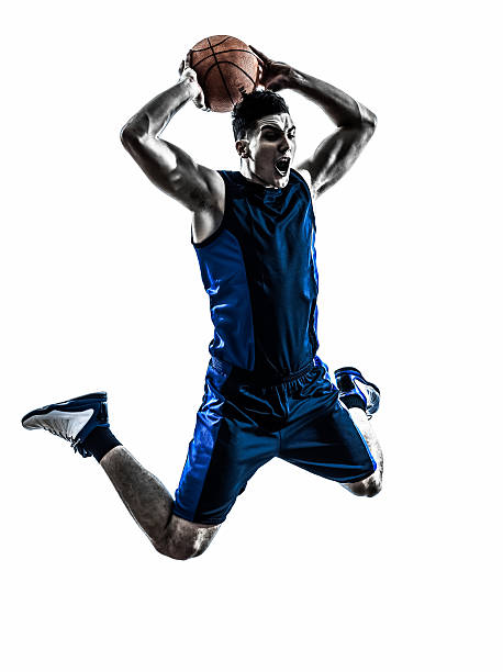 istock caucasian man basketball player jumping dunking silhouette 489196925