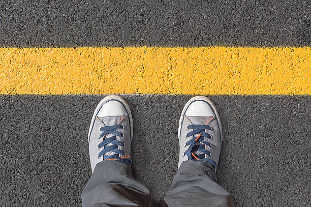 istock Standing next to yellow street lines. 489201136