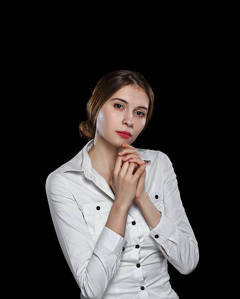 istock Young casual woman isolated over black background 489201382