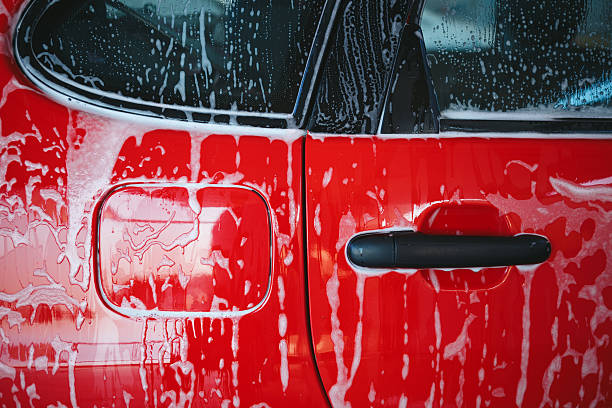 istock Wet red car wash 489202700
