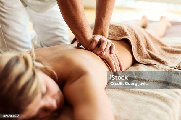 Perfect Back Massage Stock Photo - Download Image Now - Back, Close-up, Rear View