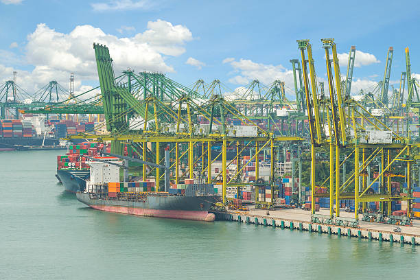 istock Industrial Container Cargo freight ship with working crane bridg 489208262