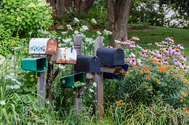 istock Rural Mailboxes in a Flower Garden 489210448