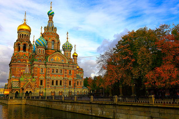Russian Church Savior on Spilled Blood autumn dramatic sunset Church of the Savior on Spilled Blood dramatic sunset and canal, St. Petersburg, Russia. onion dome stock pictures, royalty-free photos & images