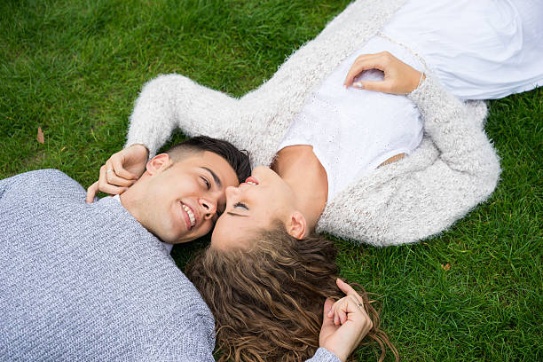 istock couple walking in the Hyde Park, London 489213304