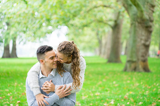 istock couple walking in the Hyde Park, London 489213632