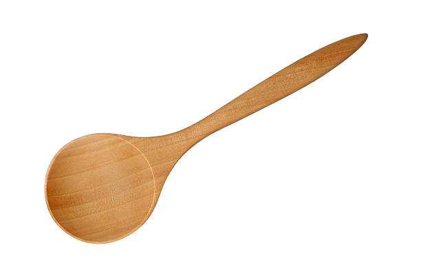 Wooden Spoon isolated on white background stock photo