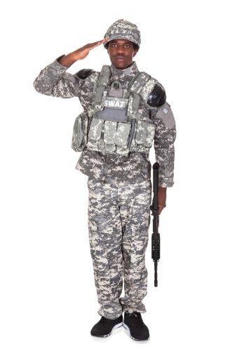 Portrait Of Afro-american Army Soldier Saluting Over White Background