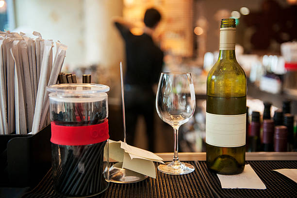 istock Bottle of wine and glas on a counter 489219167