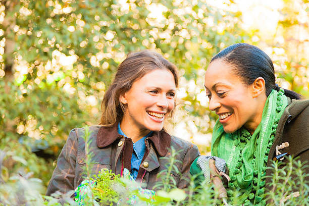 istock Women Gardeners smiling and digging 489219193