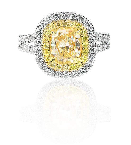 istock Colored diamond canary yellow in halo setting engagement wedding ring 489220147