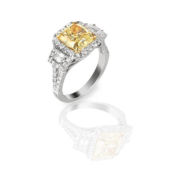 istock Colored diamond canary yellow in halo setting engagement wedding ring 489220247