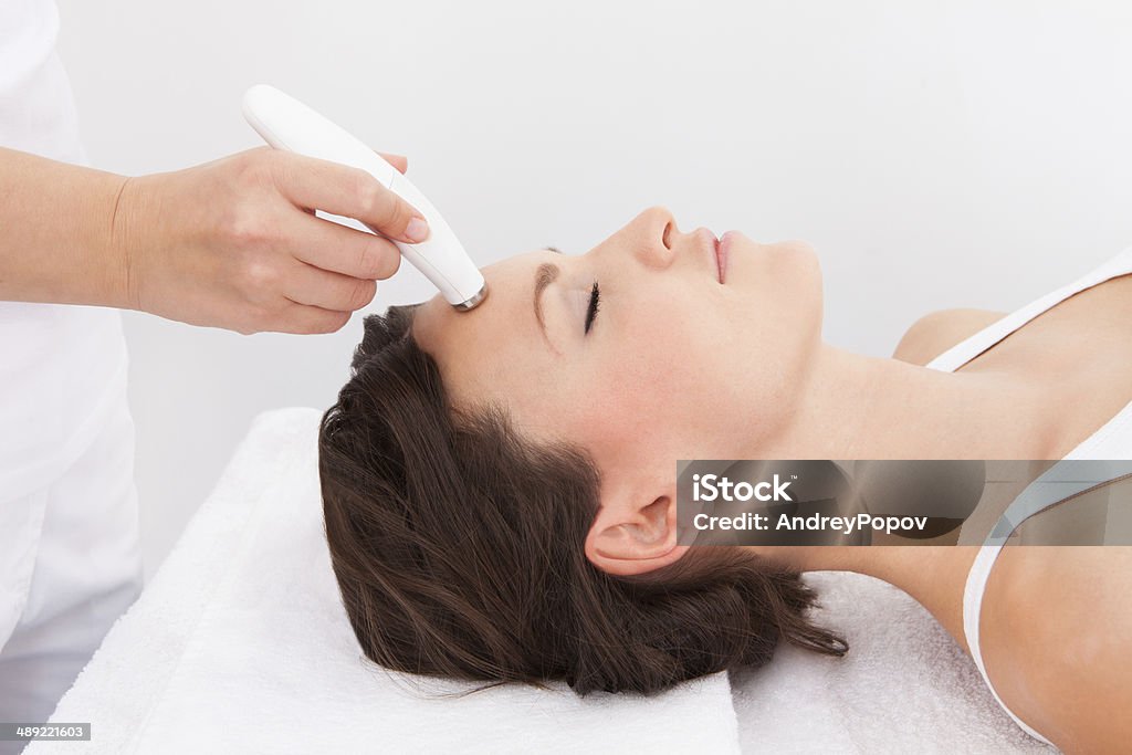 Woman Under Going Microdermabrasion Treatment Young Attractive Woman Undergoes Microdermabrasion Therapy In Spa Adult Stock Photo