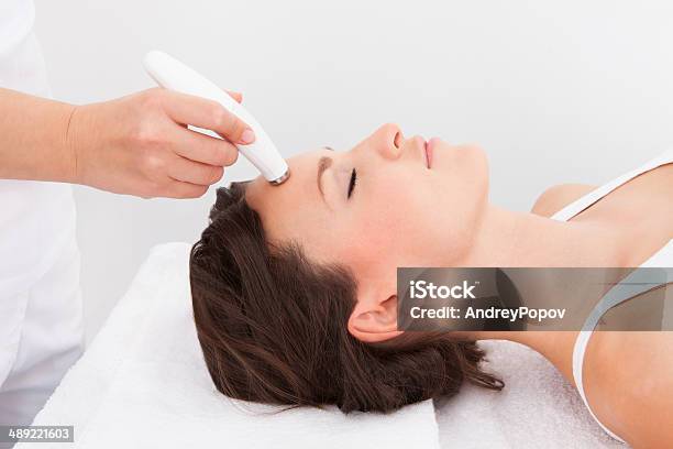 Woman Under Going Microdermabrasion Treatment Stock Photo - Download Image Now - Adult, Adults Only, Alternative Therapy