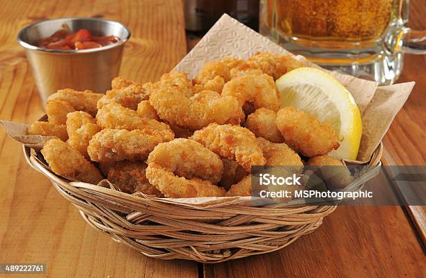 Popcorn Shrimp And Beer Stock Photo - Download Image Now - Shrimp - Seafood, Basket, Breaded