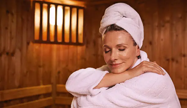 Shot of a mature woman in a sauna